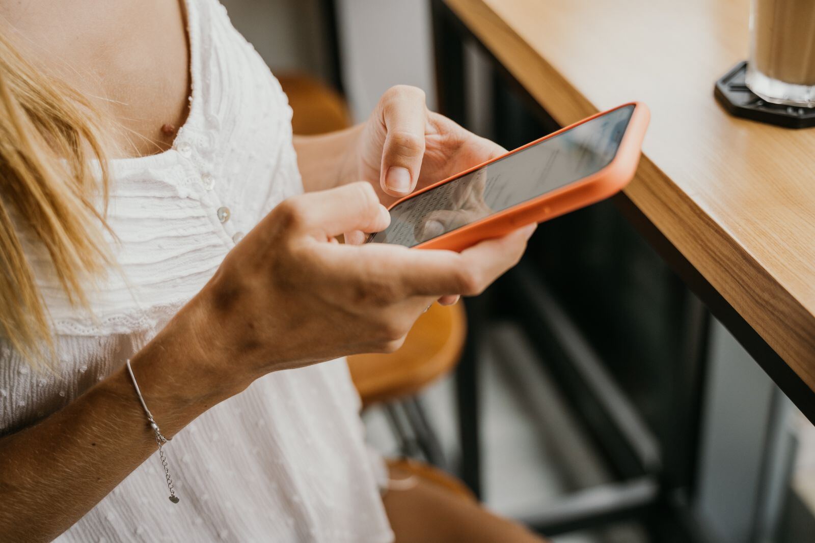Client booking a beauty appointment on a smartphone — salon online booking system